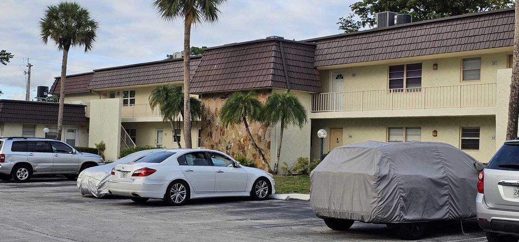 Photo of 12005 Poinciana Boulevard #102, Royal Palm Beach, FL 33411 (MLS # B26019146)