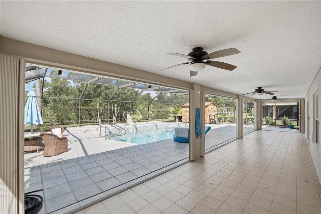 Photo of 306 SW Panther Trace, Port Saint Lucie, FL 34953 (MLS # B26031017)