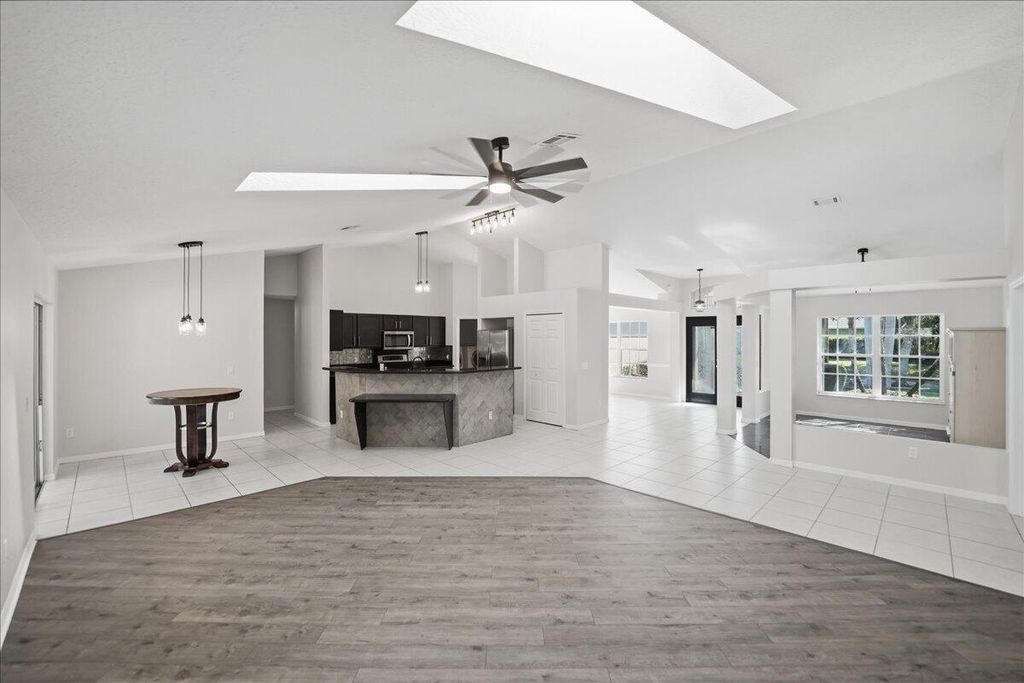 Photo of 306 SW Panther Trace, Port Saint Lucie, FL 34953 (MLS # B26031017)