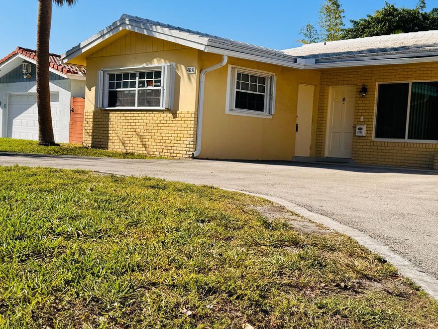 Excellent location in one of Fort Lauderdale's best neighborhoods! This well-located half-duplex features 3 bedrooms and 2 bathrooms with tile flooring throughout. Enjoy a modern, open-concept kitchen boasting stainless steel appliances, granite countertops, a pantry, and ample white cabinetry for storage. The large laundry room provides convenient side access. Outside, the fenced patio offers privacy, perfect for morning coffee or enjoying the sunset. This home includes recently updated bathrooms, fresh paint, impact windows in every room, and hurricane shutters for the front room. The circular driveway easily accommodates 3 vehicles. Situated just 10 minutes from the beach and within walking distance to dining and shopping.