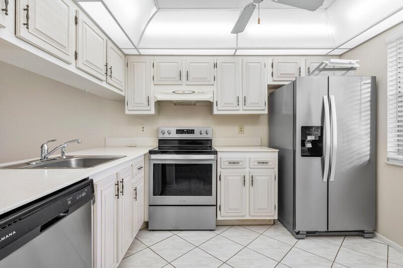 Ground floor 2 bedroom, 2 full bath corner unit in the gated community of Wynmoor. This is a clean unit with a split bedroom floor plan and updated appliances in the kitchen. Primary bedroom with spacious walk in closet and en-suite bathroom w/ stall shower. Hurricane shutters throughout. Lovely screened in patio with garden view. Wynmoor is an active 55+ community with a magnificent clubhouse. Amenities include a resort style pool, jacuzzi, on site cafe, billiards, shuffleboard courts, fitness center, tennis courts, pickleball courts, a golf course, and a theatre. Over 80 different clubs to choose from in addition to many classes. Association requires 20% down.