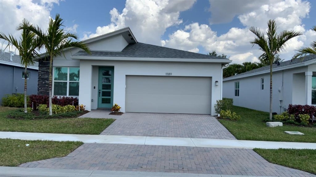 Photo of 14108 SW Enzi Way, Port St Lucie, FL 34987 (MLS # R10931938)