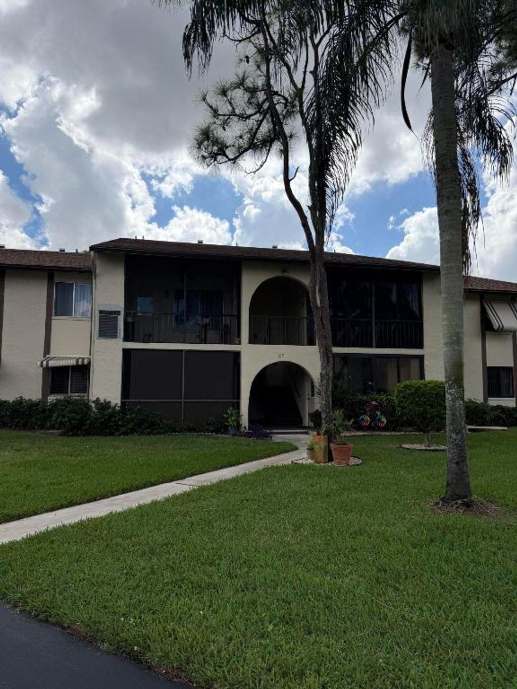 Photo of 329 Knotty Pine Circle #A-1, Greenacres, FL 33463 (MLS # R11141738)