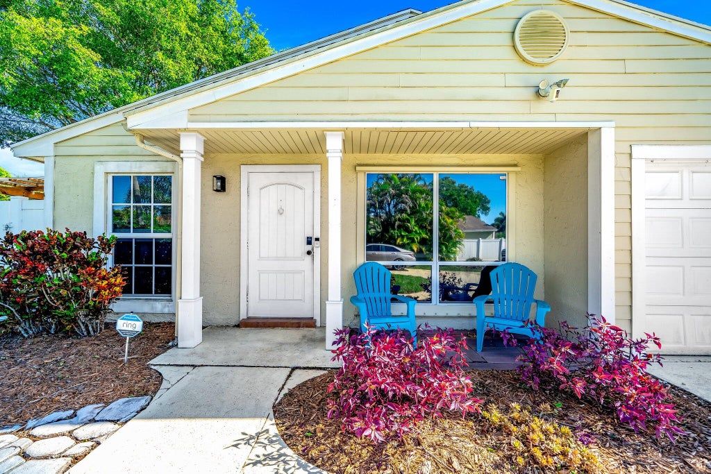 Photo of 8315 GARDEN GATE Place, Boca Raton, FL 33433 (MLS # B26085018)