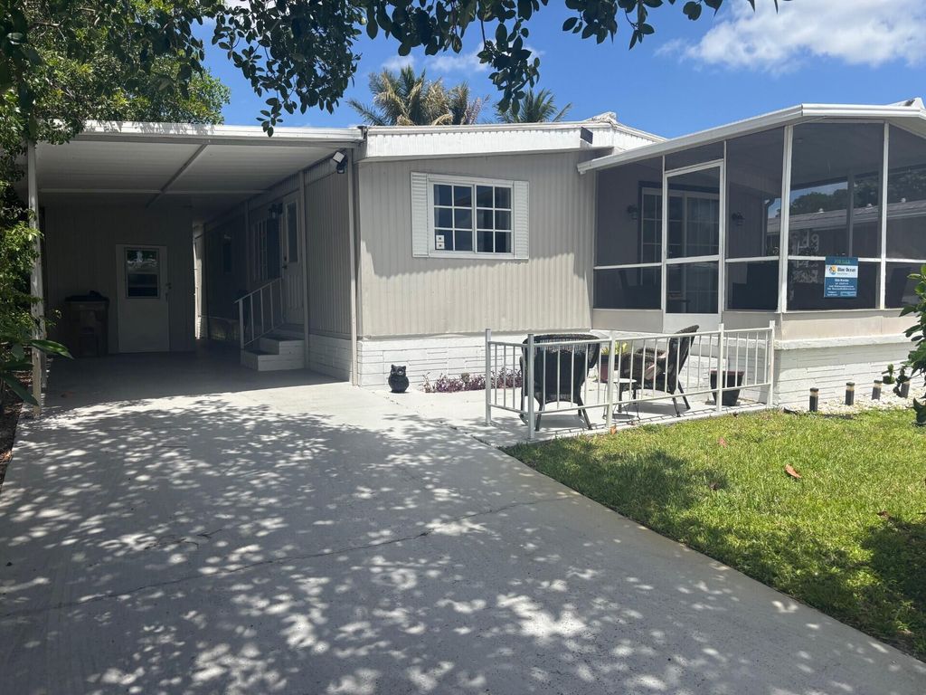 Photo of 1813 Sabel Drive, Deerfield Beach, FL 33442 (MLS # B26018579)