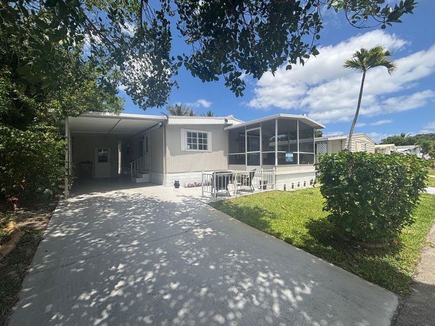 LOCATION, LOCATION, LOCATION!!!   VERY WELL MAINTAINED WITH 2 BEDROONS AND 1 BATH.  LOCATED IN A 55+ COMMUNITY, ONLY 3 MILES FROM DESIRABLE DEERFIELD BEACH. HOME IS ON A CORNER LOT WHICH PROVIDES MORE PRIVACY. IT HAS ENCLOSED PORCH AND DECK WITH A VIEW OF THE CANAL OFFERING CONFORT AND SERENITY. ALL THE SPACE TO SPEND TIME WITH FAMILY AND FRIENDS.  IT ALSO HAS LOTS OF UPGRATES TO INCLUDE: NEW HOT WATER HEATER, 2026, AC UNIT ABOUT 2 YEARS, UPDATED KITCHEN WITH NEW COUNTER TOPS, NEW APPLIANCES AND SINK. NEW GARBAGE DISPOSAL,  NEW PLUMING IN KITCHEN, NEW DRYER AND A 3-1 WASHING MACHINE. BATHROOM UPDATED WITH NEW SHOWER DOOR, MOVABLE FAUCETS AND NEW MIRROR. NUMEROUS UPDATES TO MENTION. LOT RENTAL $1,670