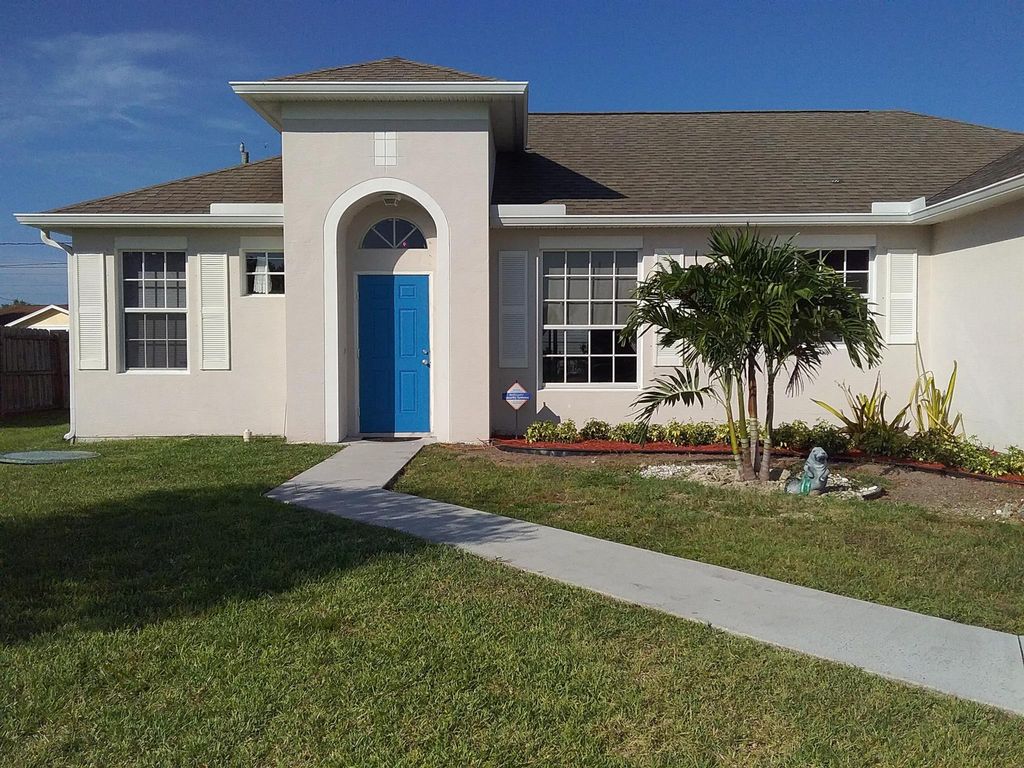 Photo of 2449 SE Camarin Street, Port Saint Lucie, FL 34952 (MLS # R10961453)