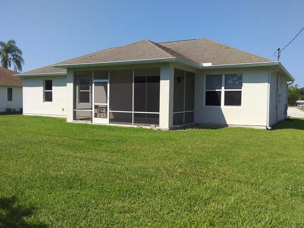Photo of 2449 SE Camarin Street, Port Saint Lucie, FL 34952 (MLS # R10961453)