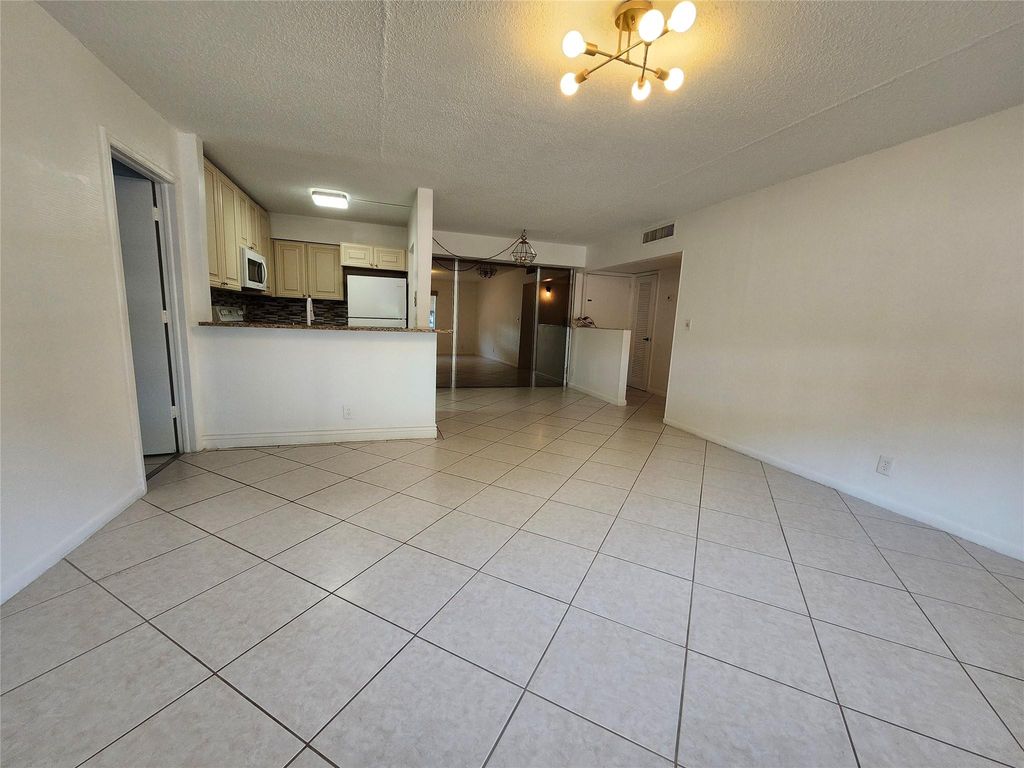 Photo of 501 SE 8th Street #103, Deerfield Beach, FL 33441 (MLS # F10536815)