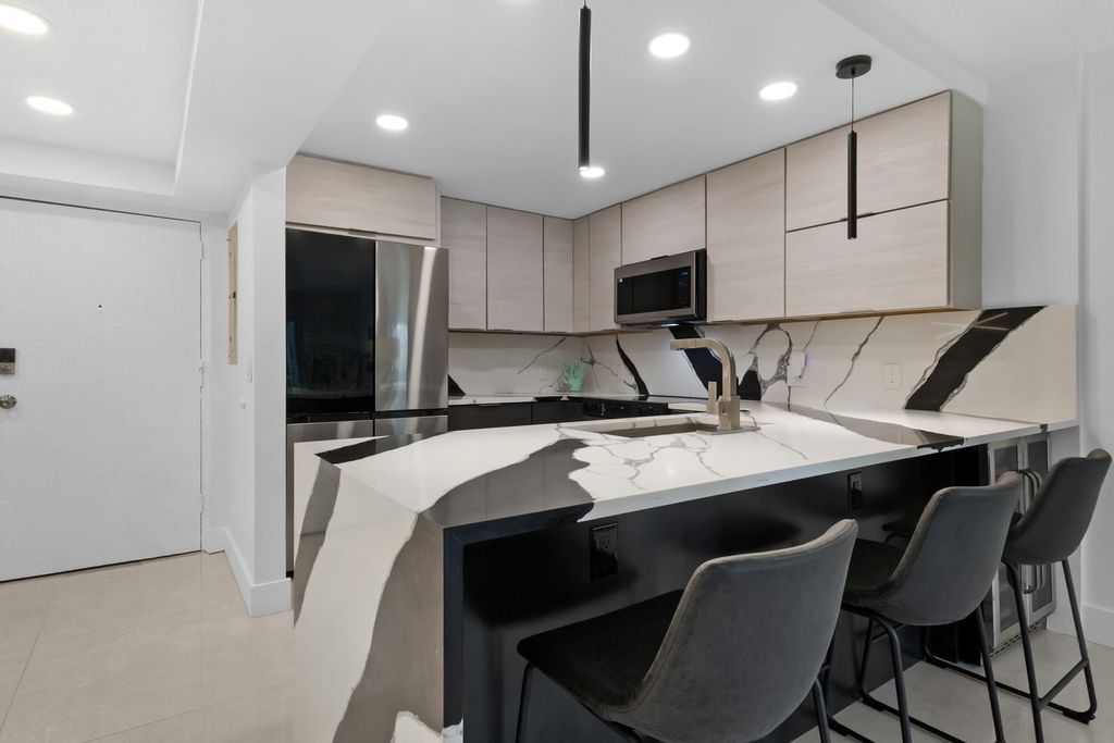 Photo of 3004 NE 5th Terrace #210-c, Wilton Manors, FL 33334 (MLS # B26008532)