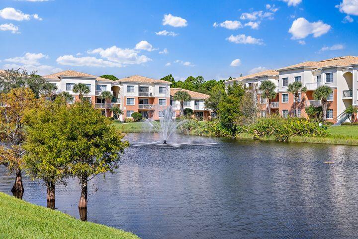 Beautifully Bright 2-Bedroom Condo with Pool Views in Prime Location. This fantastic 2 bedroom, 2 bathroom end unit condo is filled with natural light and offers serene pool views, soaring 10-foot ceilings, and a thoughtfully expanded kitchen--ideal for everyday living and entertaining. A full-size washer and dryer add extra convenience. Located in Fiore at the Gardens, this secure gated community offers true resort-style living with top-tier amenities: a stunning pool, screened outdoor dining area with BBQ grill, putting green, fitness center, playground, and on-site car wash. All of this just 4 miles from the pristine beaches of Jupiter!
