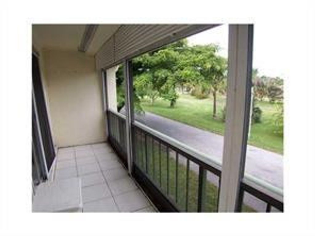 Photo of 4116 NW 88th Avenue #201, Coral Springs, FL 33065 (MLS # F10554127)