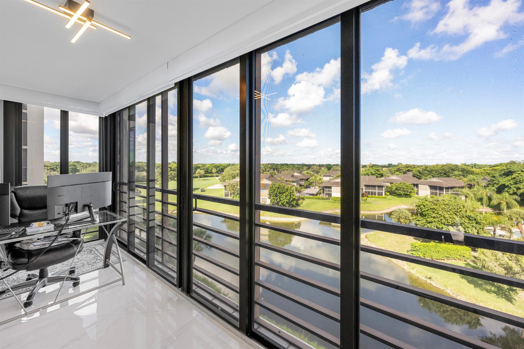 Stunning 6th-floor 3BR/2BA condo in the coveted Regency at Boca Pointe with an expanded floor plan Just Under 2000 sqft . Porcelain flooring throughout Living area . All Done in 2024 fully remodeled kitchen features quartz countertops & Backsplash With top-of-the-line appliances. All Bathrooms Fully Remodeled Enjoy a bright, open layout with breathtaking golf and water views, updated baths, and French oak in bedroom floors. Additional highlights include impact windows, Top Of the line Toilets ,built-in closets, water filtration , extra storage, and a covered parking space. Boca Pointe offers a resort-style pool and clubhouse with no membership required. Only 2 units per floor New LG Washer & Dryer in unit Water included with hoa --a rare find and move-in ready!
