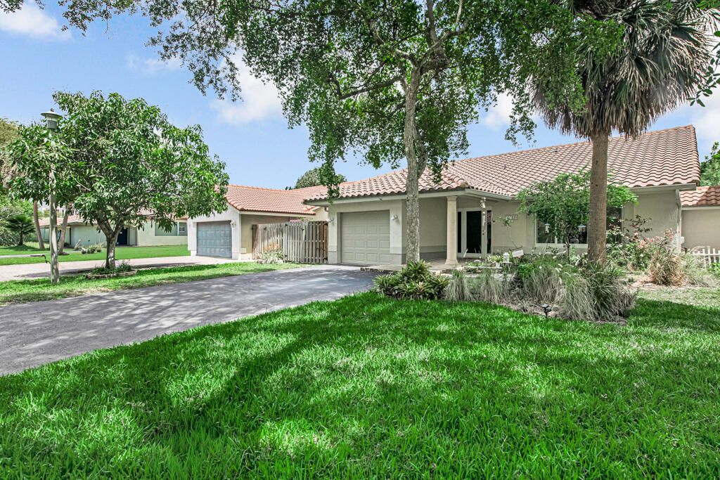 Photo of 3033 NW 95th Avenue, Coral Springs, FL 33065 (MLS # B26015516)