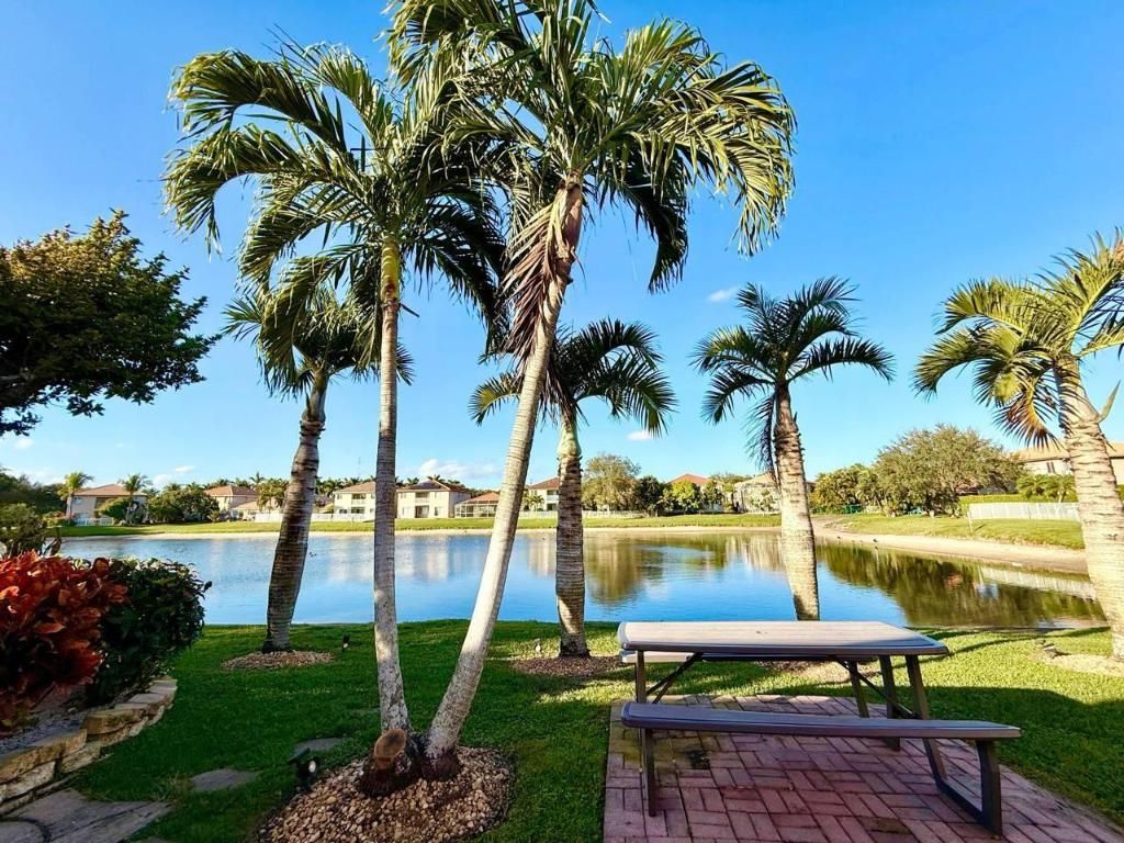 Photo of 1067 Big Torch Street, Riviera Beach, FL 33407 (MLS # R11157909)