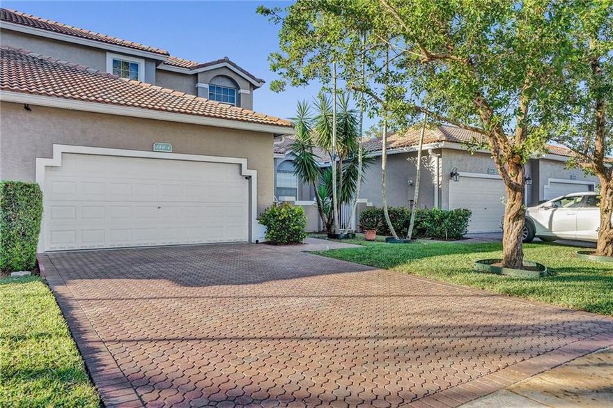 Must See Home in Highly Desirable Home in the Gated Community of Regency Club. Ready to Move In, Great Condition, Remodeled Bathrooms and Vaulted Ceilings Throughout. Spacious Eat-In Kitchen and Dining area. Master on First Floor with Walk-in Closet and Second Master on Second Floor with Den. Separate Laundry Room. Garage and Parking Spaces. Tile Roof. Screened-In Patio with Lake View. Private Community with Great Location, Quiet and Amenities Feature Pool and Pool, Tennis, Gym, Lawn Care and Premium Cable with Low HOA Fee. Must See.