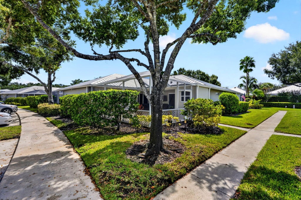 Photo of 1555 SW WATERFALL Boulevard, Palm City, FL 34990 (MLS # B26078254)