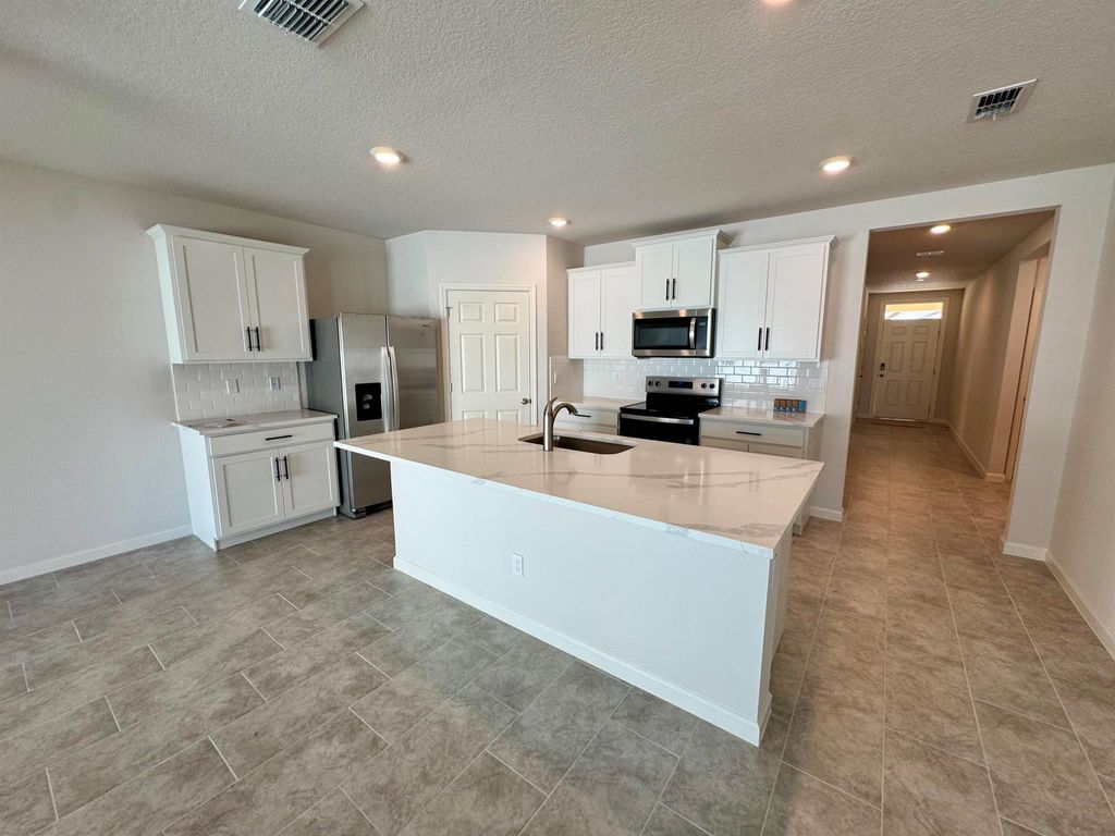 Photo of 9635 Sea Spray Drive, Fort Pierce, FL 34945 (MLS # R11138303)