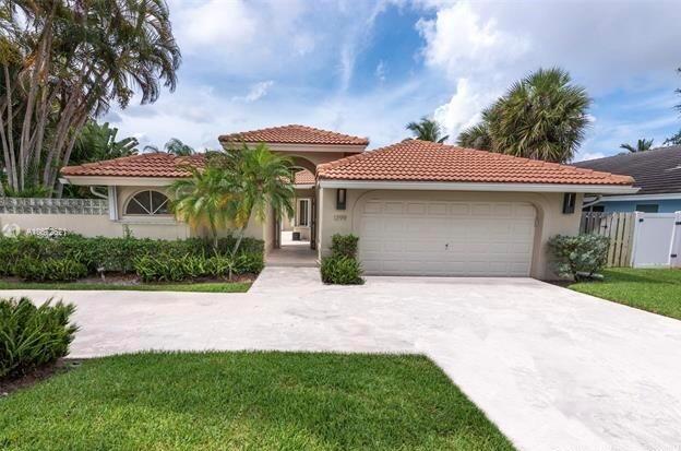 This Palm Beach Farms home in Boca Raton has it all: 4 bedrooms, 3 full baths, oversized fully fenced lot with separate guest suite house, very private pool with spa, huge circular drive and 2 car garage, master bedroom suite with walk-ins, 10-foot ceilings, washer & dryer, alarm system, and more. Landscaping, pool service and pest control included.