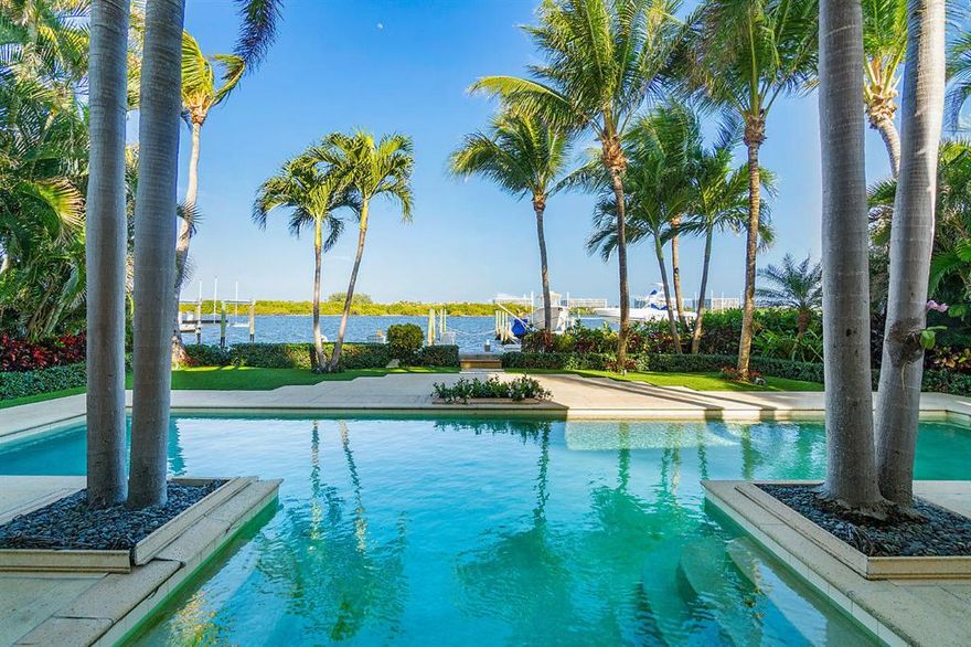 There are approximately 20 direct Intracoastal front homes in the highly desirable, not in the flight path, South End neighborhood. This is the only one currently on the market. This incredible, 5 bedroom, 4 bath waterfront estate home features a smart layout and luxurious details. With the Intracoastal directly in your backyard, the unobstructed views of the water and Palm Beach can be taken in from windows in nearly every room. Just under 4,600 total square feet this home is replete with features appreciated by the most discriminating buyer; a resort style pool & full Wolf outdoor kitchen, a new master suite addition with Intracoastal and ocean views, full impact glass hurricane windows, chef's kitchen with Viking appliance suite, 2 garage, and dock with lifts. The South End Neighborhood, or ''SOSO'' is central to the best that the area has to offer.Ride your bike along Flagler Drive or over the bridge to Palm Beach, a short trip to Worth Avenue or exclusive clubs like The Bath and Tennis Club and Mar-a-Lago. Minutes from the airport and downtown West Palm Beach and City Place. Many terrific options for A rated public and private schools.