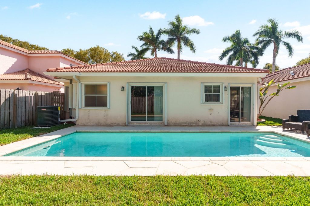 Photo of 4755 NW 7th Manor, Pompano Beach, FL 33063 (MLS # F10554750)