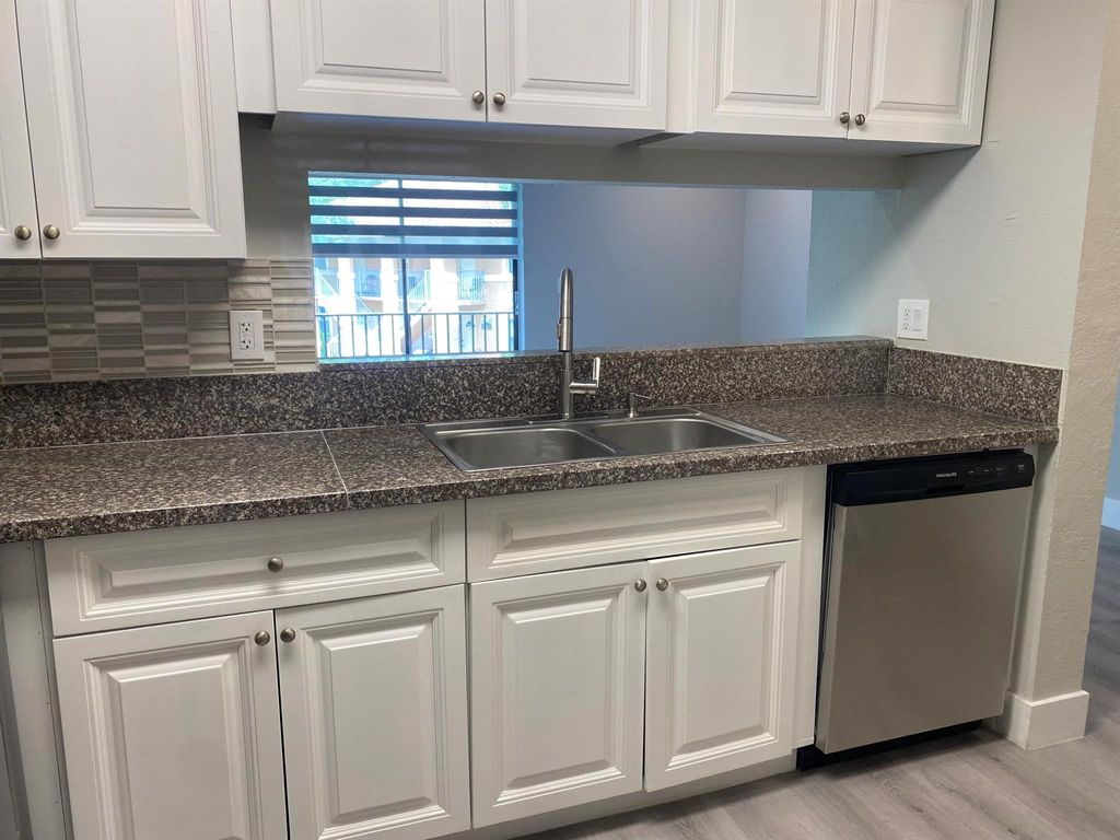 Photo of 11430 NW 43rd Street #1-4, Coral Springs, FL 33065 (MLS # R11109548)