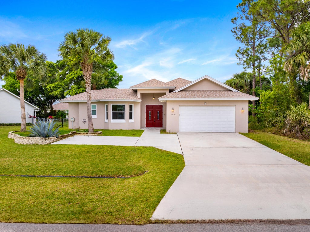 Photo of 1674 SW Pancoast Street, Port Saint Lucie, FL 34987 (MLS # R11069371)