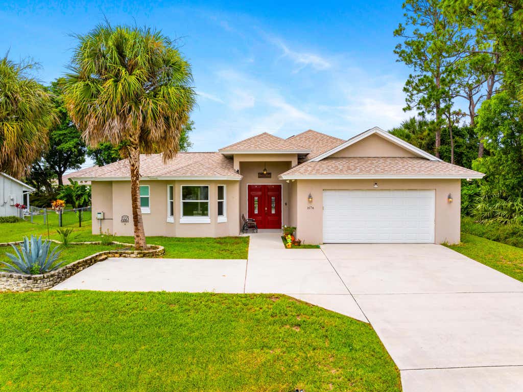 Photo of 1674 SW Pancoast Street, Port Saint Lucie, FL 34987 (MLS # R11069371)
