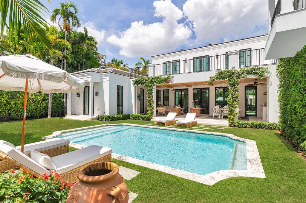 Photo of 302 E Lakewood Road, West Palm Beach, FL 33405 (MLS # R11143511)