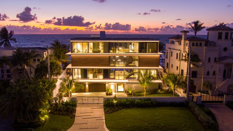 ''New'' La Plage Villa -  An oceanfront estate by acclaimed Sabal Development sited on 100 +/- feet of beach frontage in prestigious Highland Beach with ultra-modern organic and natural  finishes that are juxtaposed to combine a sophisticated magical oceanfront experience. A tour de force architectural statement on 4 levels encased in glass with spectacular oceanviews from all major rooms.  Roof top sky-deck and 5-bay garage for the connoisseur.  Shown By Appointment Only.