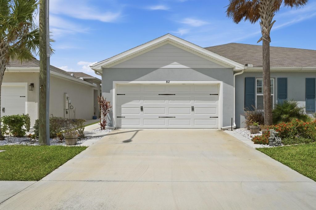 Photo of 812 Persimmon Place, Fort Pierce, FL 34981 (MLS # B26015026)