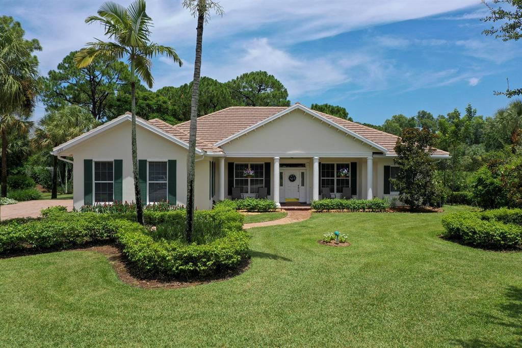 Photo of 1680 SE Cypress Glen Way, Stuart, FL 34997 (MLS # R10730128)