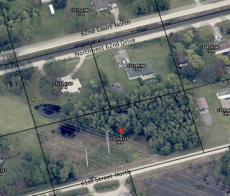oversized high dry lot in a great location, ideal for a home with equestrian features such as arena, Plant nursery or other ag based business and or use for live stock as lot has FPL easement that runs through eastern corner of lot.