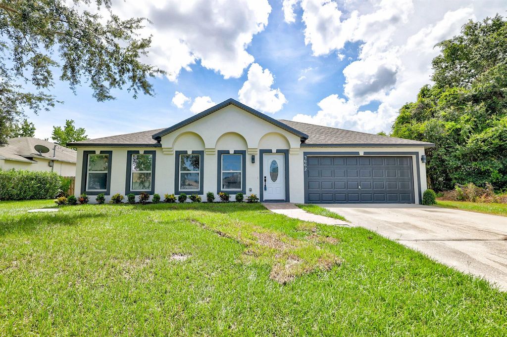 Photo of 3662 SW Vollmer Street, Port St Lucie, FL 34953 (MLS # R10905320)