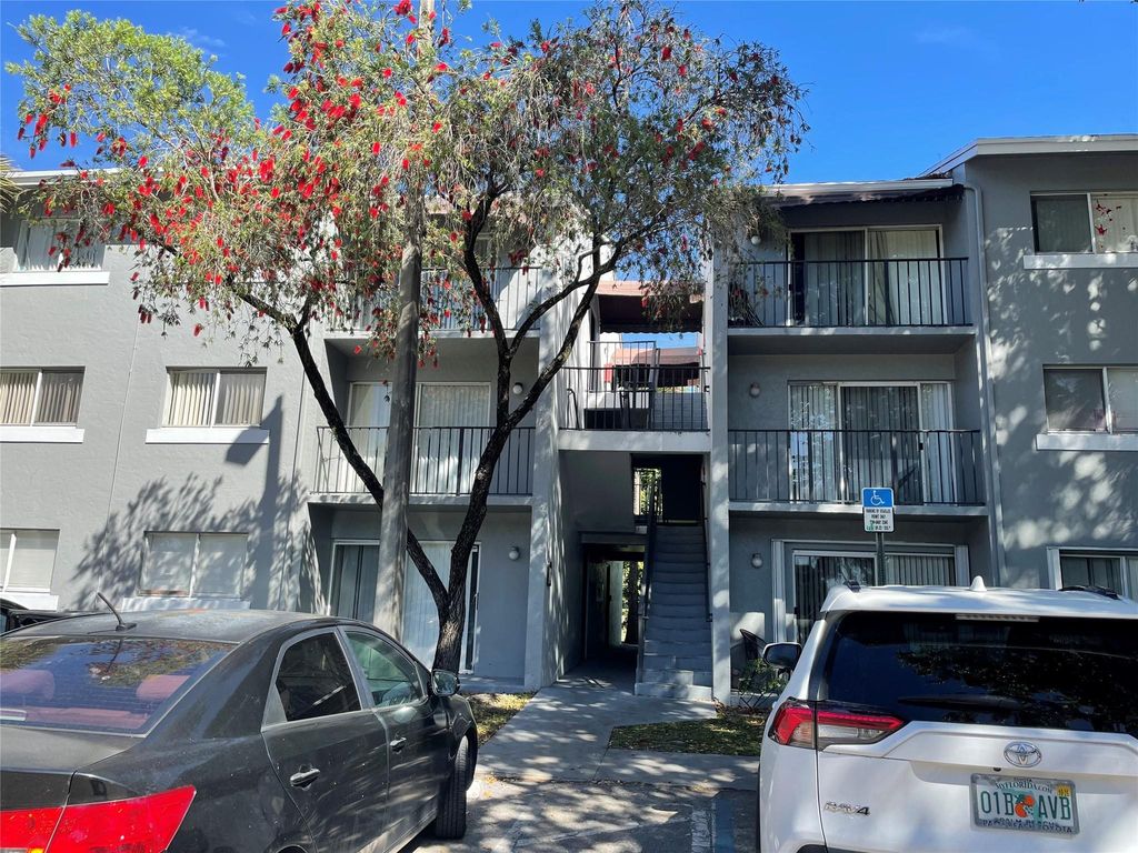 Photo of 1068 N Benoist Farms Road #205, West Palm Beach, FL 33411 (MLS # B26023637)