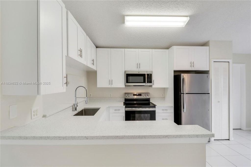 Photo of 653 NW SAN REMO Circle, Port Saint Lucie, FL 34986 (MLS # B26057286)