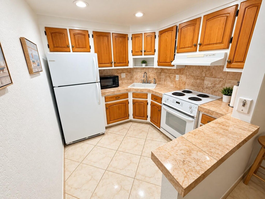 Photo of 5201 NE 24TH Terrace #A110, Fort Lauderdale, FL 33308 (MLS # B26088041)