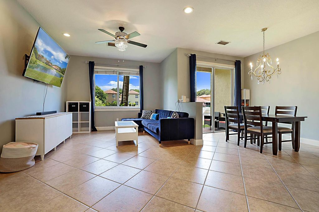 Photo of 6147 Seminole Gardens Circle, Riviera Beach, FL 33418 (MLS # R11106606)