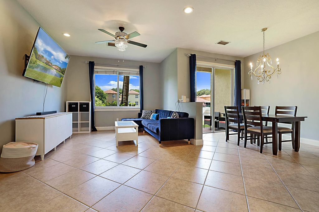 Photo of 6147 Seminole Gardens Circle, Riviera Beach, FL 33418 (MLS # R11106606)