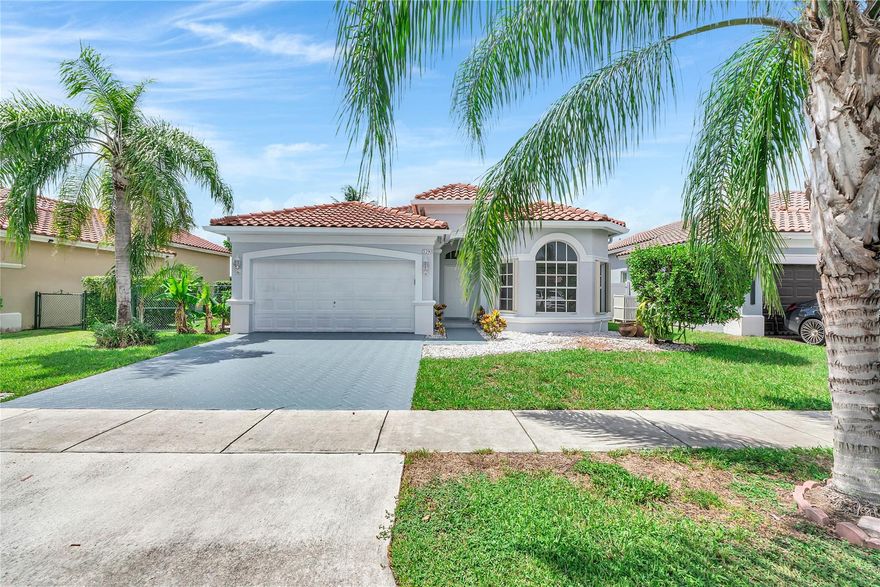 PRICE IMPROVEMENT! Check out this stunning one-story, 3 bedroom, 2 bath waterfront home, beautifully renovated w/modern finishes throughout. 
Step inside to find soaring volume ceilings & a spacious split-bedroom floor plan, designed for both comfort and privacy. Both bathrooms have designer finishes that are truly unique. 
The heart of the home is the open-concept kitchen, featuring brand-new appliances, sleek cabinetry & elegant waterfall granite countertops-perfect for entertaining & everyday living. Large windows fill the living spaces w/ natural light while offering serene water views.
Enjoy the tranquility of waterfront living w/ the convenience of a large, new patio & wide lake view. With its modern touches,bright open layout & prime location,this home is truly move-in ready!
