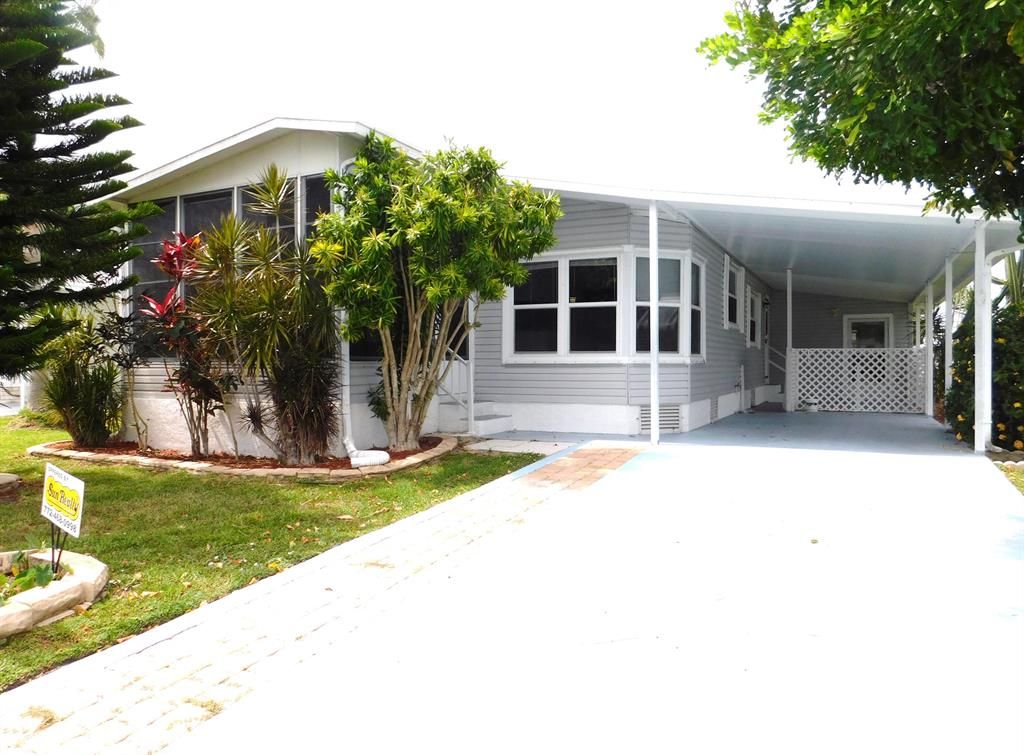 Photo of 485 Hemingway Terrace #4, Fort Pierce, FL 34982 (MLS # R10715842)