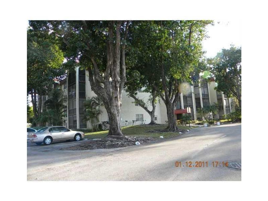Photo of 3280 Spanish Moss Ter #209, Lauderhill, FL 33319 (MLS # F10531690)