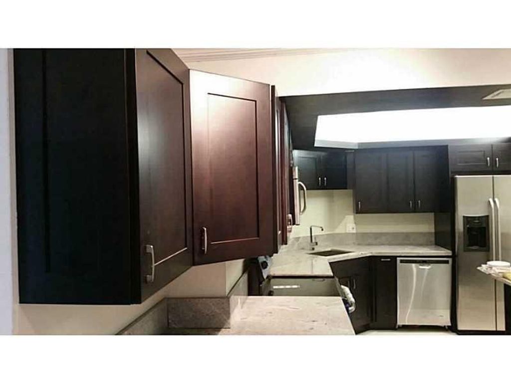 Photo of 3280 Spanish Moss Ter #209, Lauderhill, FL 33319 (MLS # F10531690)