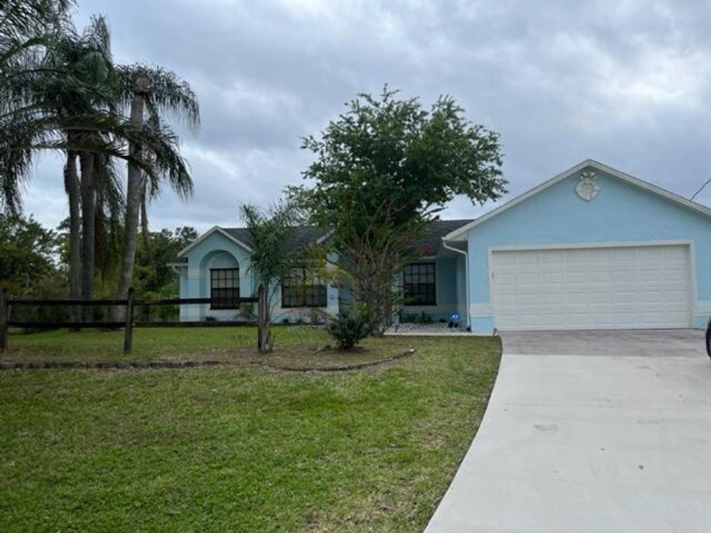 Photo of 2298 SW Jay Avenue Ave, Port St Lucie, FL 34953 (MLS # R10789273)