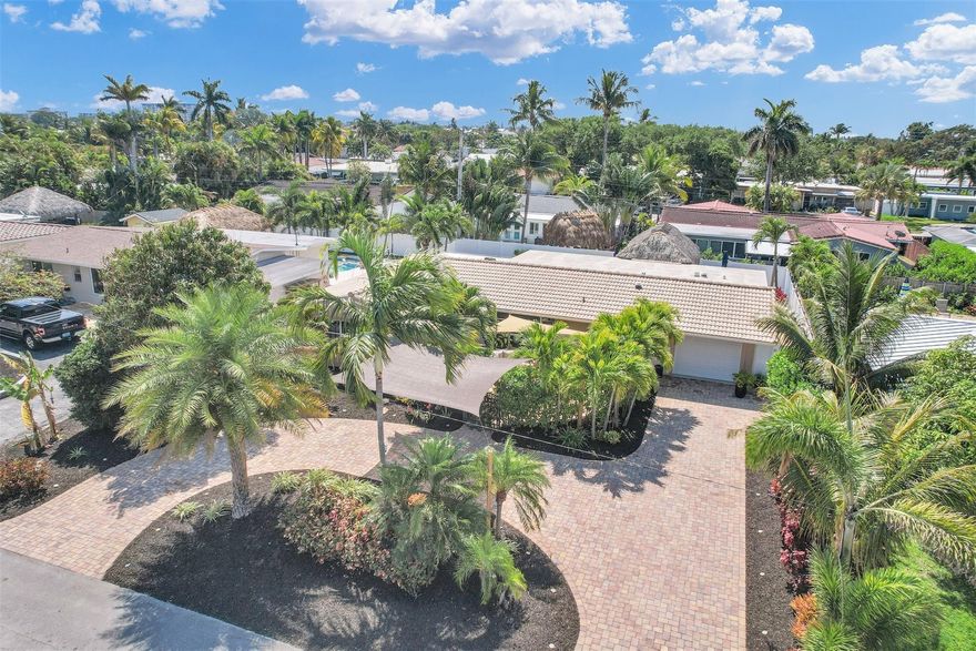 STUNNING 3BR/3BTH POOL HOME WELL LOCATED IN THE DEERFIELD COVE! IN CLOSE PROXIMITY TO THE COVE SHOPPING CENTER, PUBLIX, THE ICW AND THE ISLAND/BEACH. PRIDE OF OWNERSHIP IS AN UNDERSTATEMENT WHEN REFERRING TO THIS HOME, IT HAS BEEN COMPLETELY RENOVATED, IMPACT WINDOWS/DOORS, TILE FLOORS THROUGHOUT, MINI SPLIT A/C SYSTEM IN THE MASTER BEDROOM, SALTWATER POOL, LARGE/PRIVATE SITTING AREA OUT FRONT AS WELL AS A (FENCED IN) LITERAL TROPICAL PARADISE OUT BACK - YOU'LL BE HARD PRESSED TO FIND ANYTHING TO IMPROVE UPON WITH THIS HOME - THE ATTENTION TO DETAIL AS WELL AS IMPECCABLE LEVEL OF MAINTENANCE WILL CERTAINLY LEAVE YOU IMPRESSED.