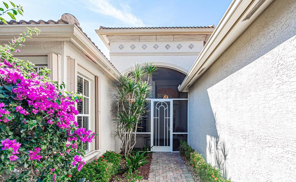 Photo of 8699 Tierra Lago Cove Cv, Lake Worth Beach, FL 33467 (MLS # R10698101)
