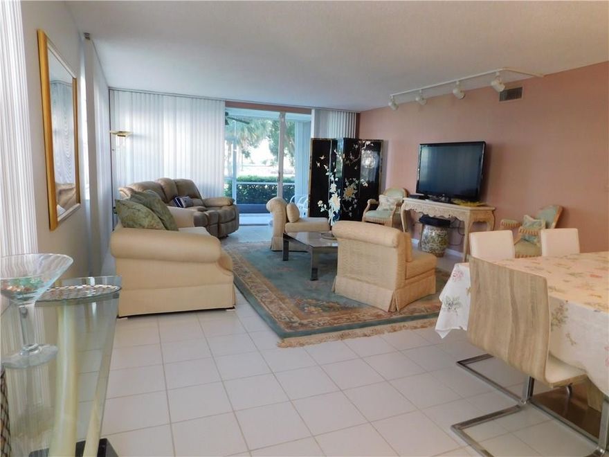 If you are looking for a spacious floor plan, look no further! This 1st flr 2 bed 2 bath condo can easily be turned into a 3 bedroom OR keep the space open for a den! With over 1700sq ft, this home features a new washer & dryer(2 yrs), all stainless steel appliances. dishwasher, oven, & fridge (1 yr old). AC & Water heater replaced in 2013. Bathrooms are upgraded with bath fitters that have a lifetime warranty. New tile installed in bedrooms. Cable & Water included in association fee. All ages community.