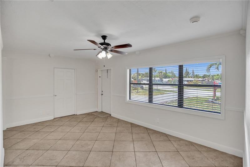Photo of 450 NE 58TH Court, Oakland Park, FL 33334 (MLS # B26079411)