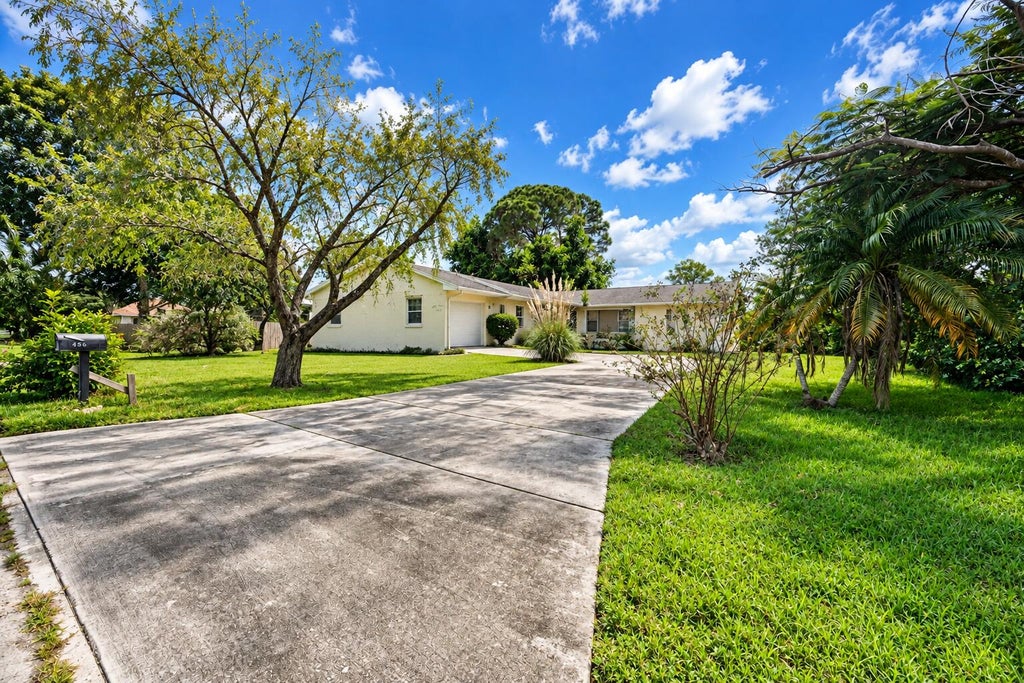 Photo of 456 NW Placid Avenue, Port Saint Lucie, FL 34983 (MLS # B26092685)