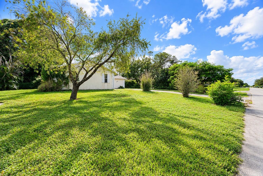 Photo of 456 NW Placid Avenue, Port Saint Lucie, FL 34983 (MLS # B26092685)